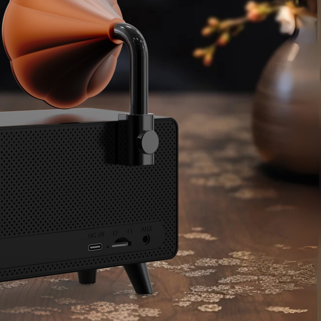 Vintage gramophone-style Bluetooth speaker with wooden body, dual front speakers, and copper horn design, combining retro aesthetics with modern wireless sound for stylish home décor
