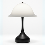 Mid-century mushroom dome lamp with soft glow, stylish bedside or living room lighting