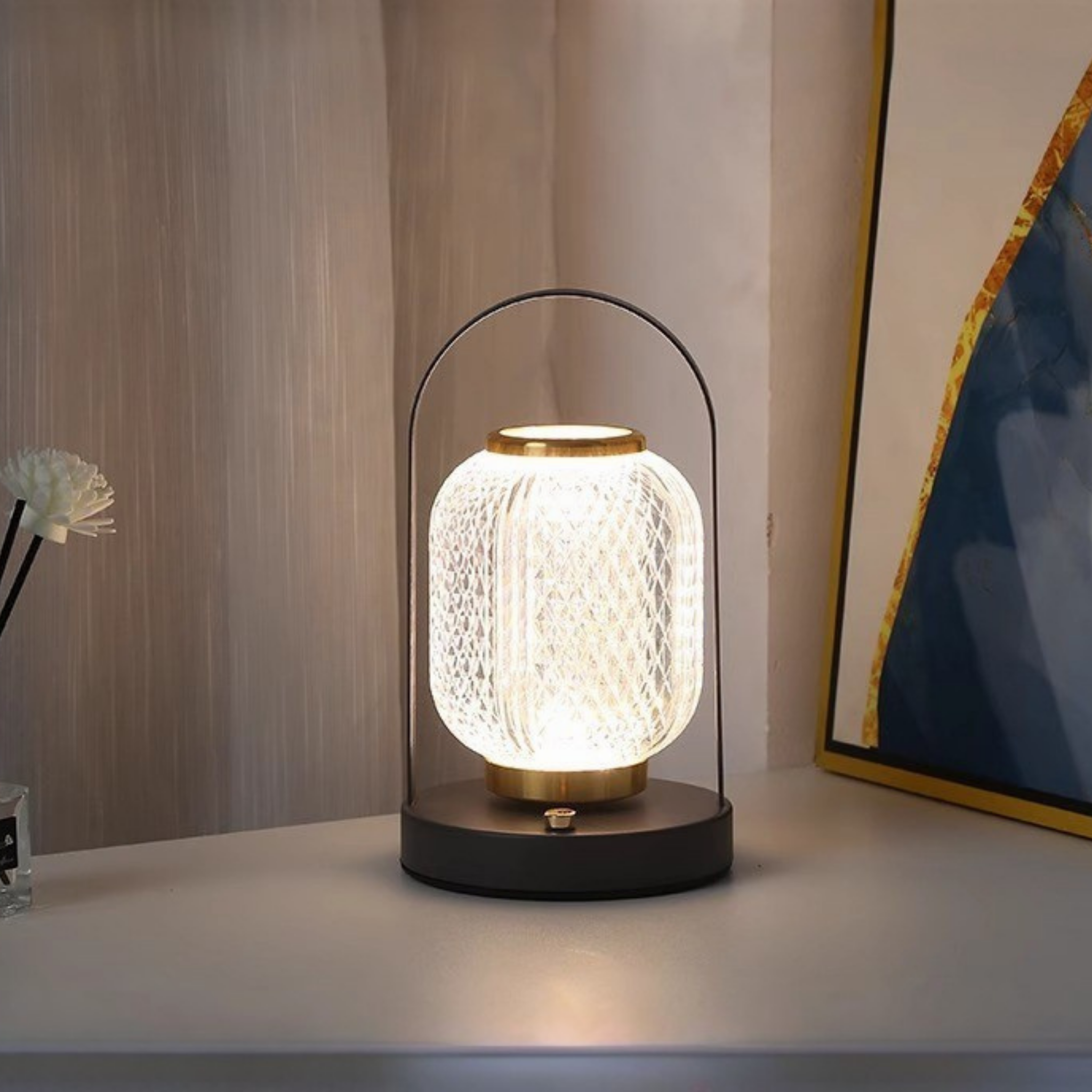 Modern portable LED table lamp with glass lantern design, warm and cool light modes, gold accents and black base, perfect for bedside, desk, or cosy living room décor
