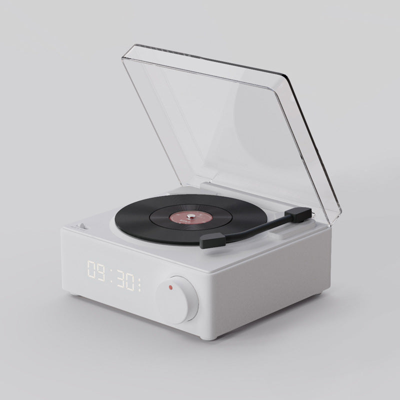 White gramophone-style Bluetooth speaker with copper horn and dual speakers, retro look with modern wireless audio