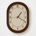 Wooden oval wall clock with cream dial, vintage-style design for elegant UK interiors