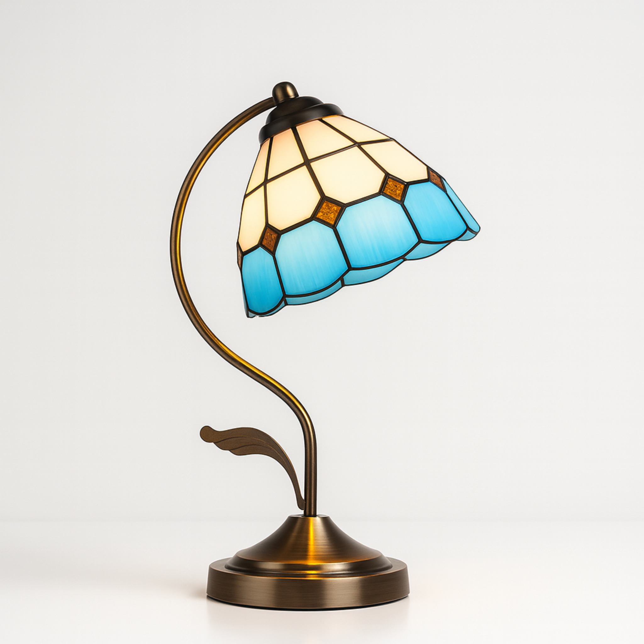 Retro Tiffany-style lamp with blue glass accents, curved bronze stand, stylish lighting