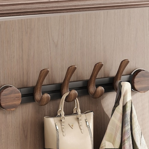 Close-up of Aalto Curve Suction Hook Rack — walnut texture and ergonomic curved 4 hook design for refined home organisation, KaShi Living