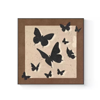 A neutral butterfly framed wall art piece with black silhouettes for UK bedrooms, hallways and cosy living spaces.