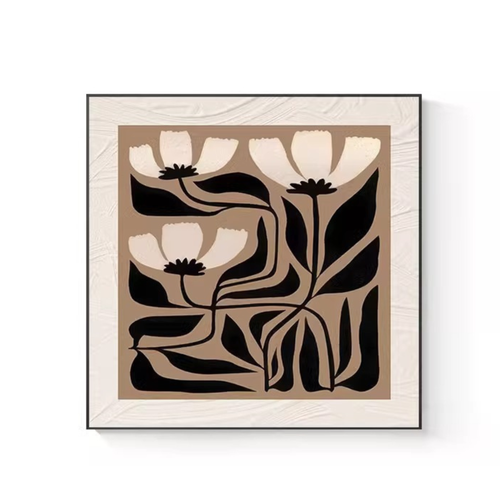A graphic floral framed wall art piece in black and warm neutral tones for UK living rooms, bedrooms and hallway styling.
