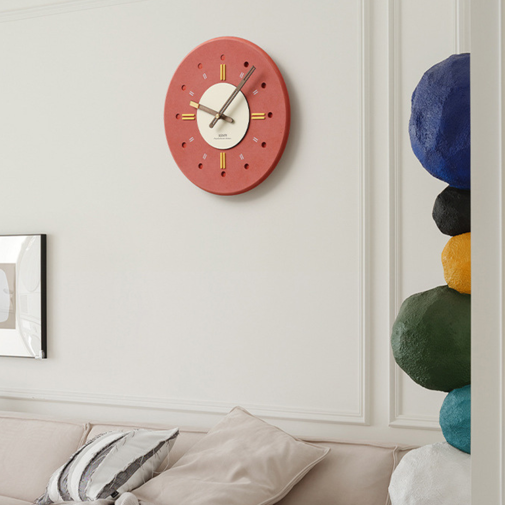 A round auburn wall clock with a warm modern look, suited to UK living rooms, kitchens, bedrooms, hallways and cosy rented homes.