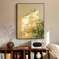 Bamboo shadow botanical framed wall art with green bamboo leaves, warm golden sunlight and leafy shadow detail for living room or hallway décor by KaShi Living