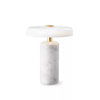 Elara Disc Portable Table Lamp with a white stone-effect cylindrical base, white rounded shade and gold-tone details.