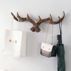 Decorative antler-style wall hook for coats, keys, bags and hallway styling. A rustic accent for cosy UK homes.