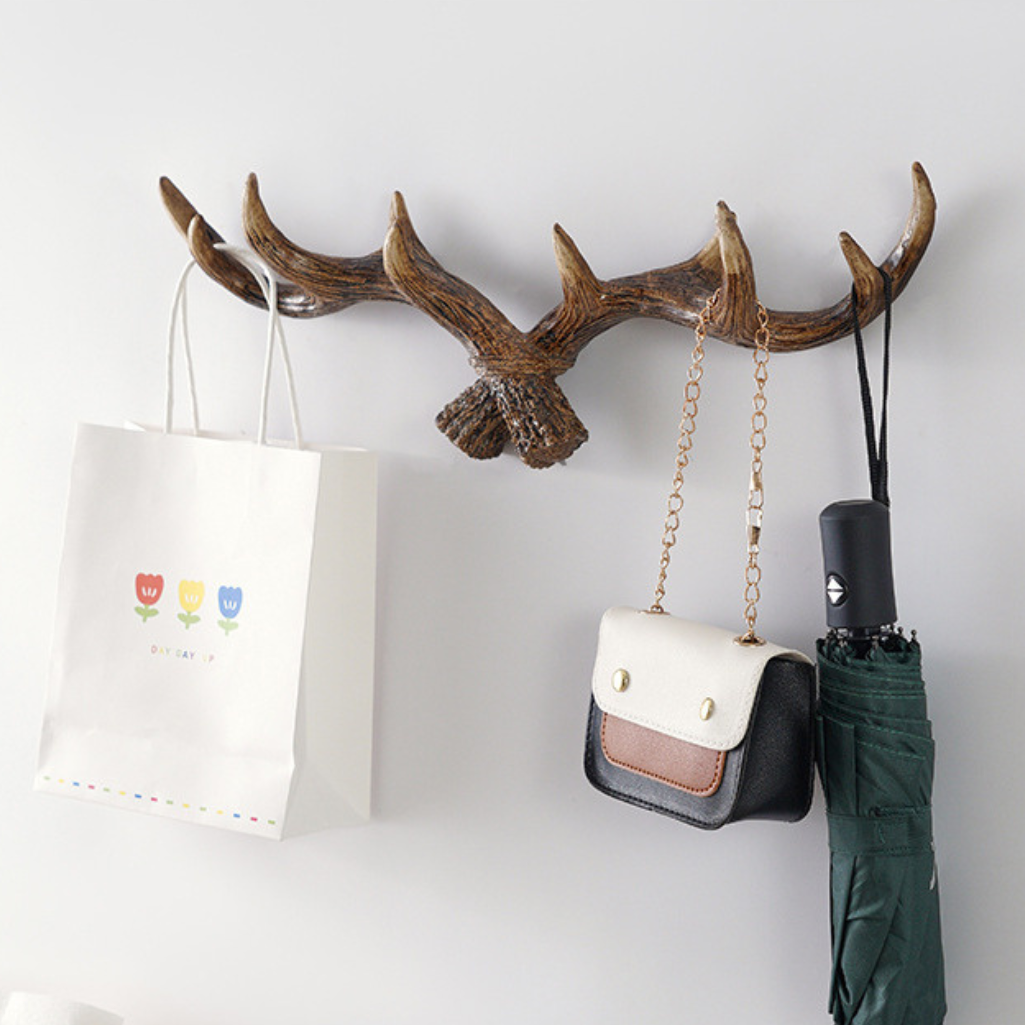 Decorative antler-style wall hook for coats, keys, bags and hallway styling. A rustic accent for cosy UK homes.
