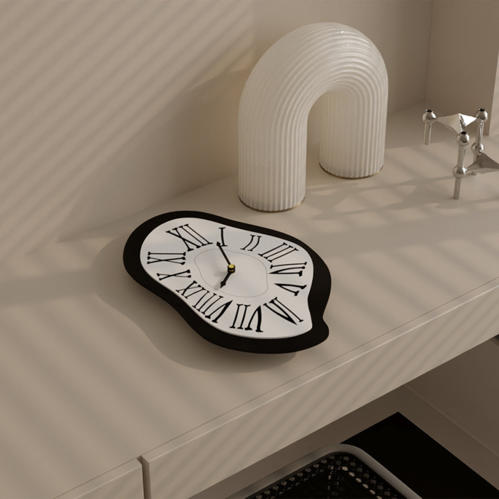 A black and white melted Roman wall clock for playful living room, bedroom, hallway or home office wall décor.