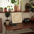 The Oslo Grain Wall Clock is a square light wood-effect wall clock with bold numbers and a white frame, suited to UK kitchens, hallways and cosy living rooms.