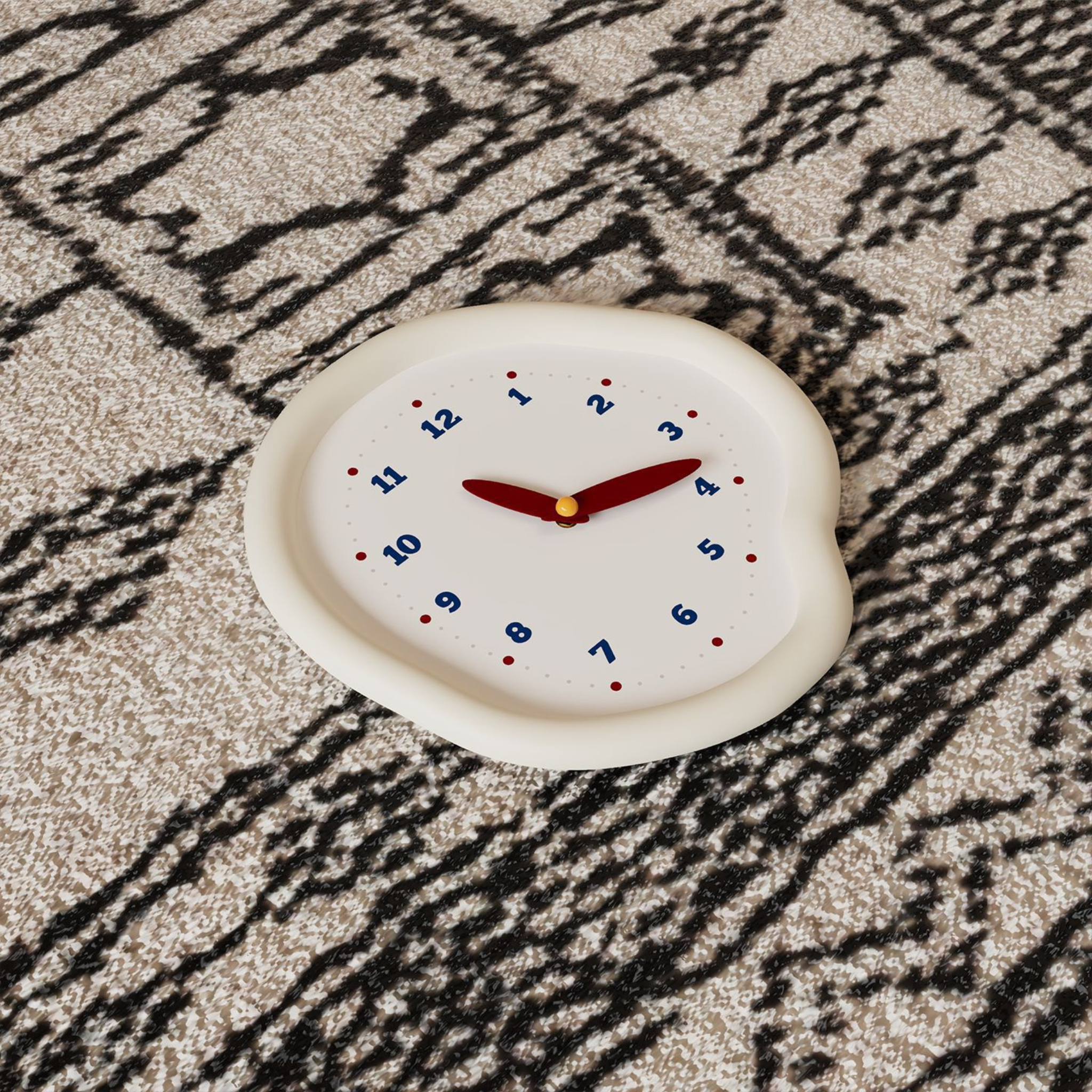 A soft ivory pebble-shaped wall clock with blue numbers and red hands, designed for UK bedrooms, kitchens, hallways and cosy living room walls.