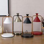 A stylish cone candle warmer lamp that gently warms jar candles while adding a cosy glow to bedrooms and living spaces.