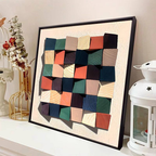 Terra Mosaic Wall Art is a framed geometric wall decoration featuring raised colourful blocks for warm, contemporary UK interiors.