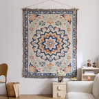 Vista Retro Textile Wall Art with blue floral medallion pattern and fringe detail in a cosy UK living room
