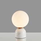 Luna Stone Lamp with white marble base — minimalist orb lamp diffusing soft warm glow, timeless elegance for bedrooms or desks, KaShi Living