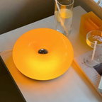 Bold orange halo table lamp for shelves, bedside tables, desks and cosy living room corners.