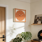 Bright orange box desk clock for shelves, desks and bedside tables, adding a playful modern accent to UK homes.