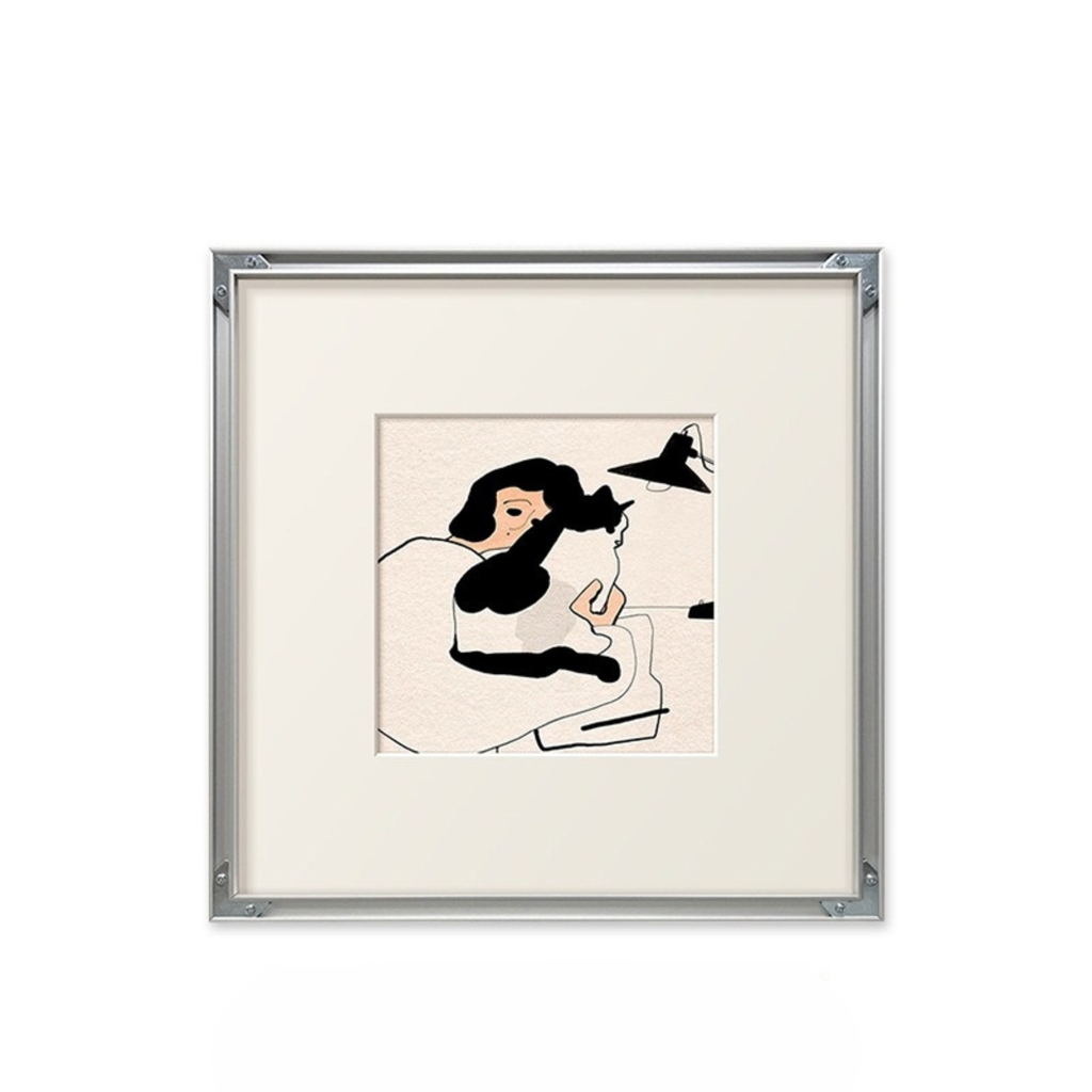 A cosy framed wall art print featuring a quiet cat scene, suited to UK bedrooms, reading corners and relaxed living rooms.
