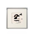 A cosy framed wall art print featuring a quiet cat scene, suited to UK bedrooms, reading corners and relaxed living rooms.