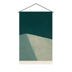 Deep teal and pale ridge abstract textile wall hanging with fringe for modern bedroom and hallway decor by KaShi Living