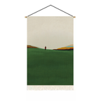 Green landscape textile wall art with small figure and fringe detail for calm living room or bedroom decor by KaShi Living