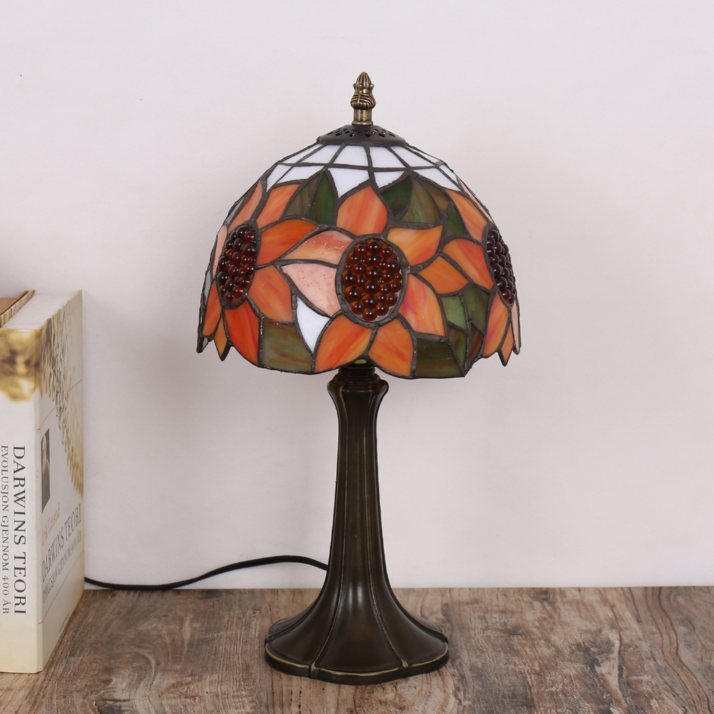 Sunlit Bloom Lamp by KaShi Living — Tiffany-style stained glass table lamp with orange flower design, bronze base, and artisan craftsmanship